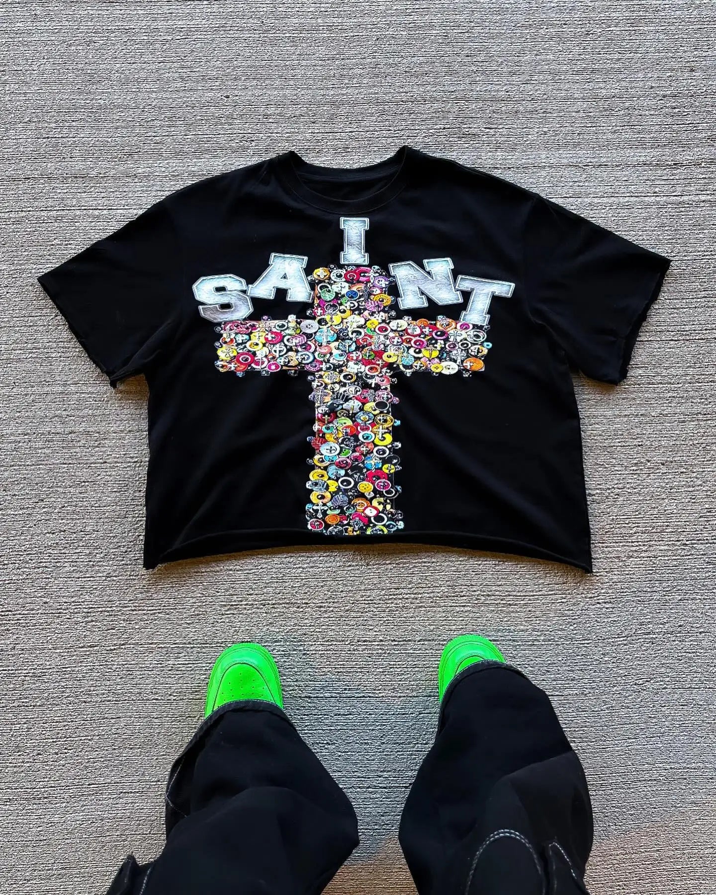 Vintage graphic t-shirt featuring a bold cross design, perfect for men and women looking for classic retro style.