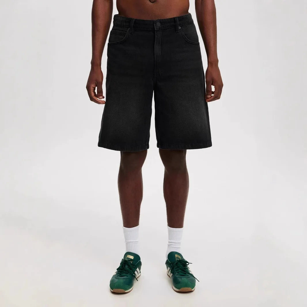 Mens denim shorts in light wash, perfect for casual summer style and comfort, featuring a relaxed fit.