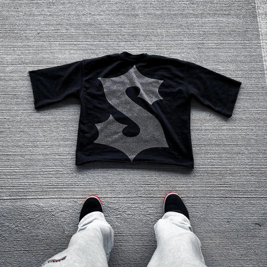 Vintage graphic t-shirt featuring a bold cross design, perfect for men and women looking for classic retro style.