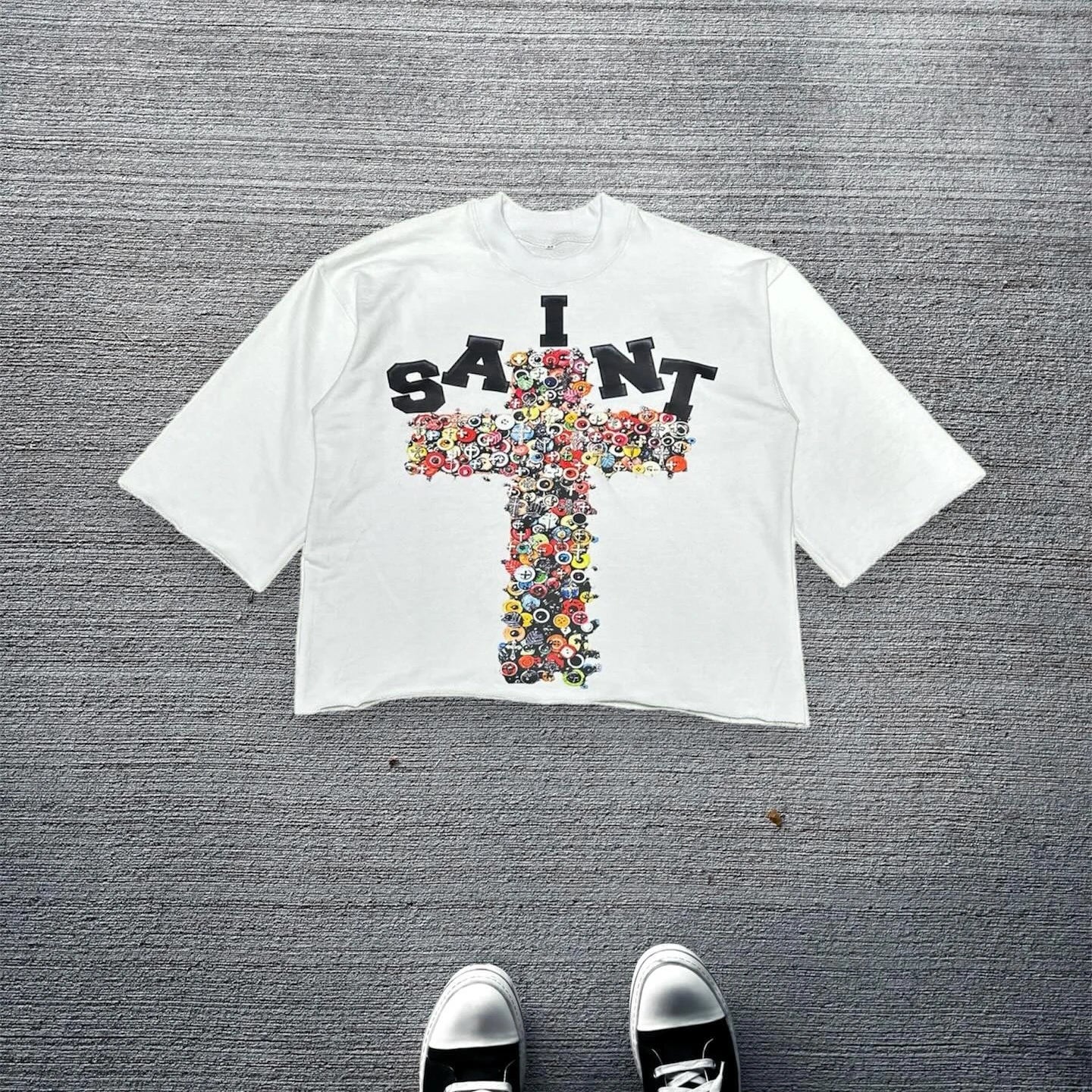 Vintage graphic t-shirt featuring a bold cross design, perfect for men and women looking for classic retro style.